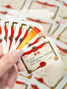 Close-up of classic award stickers for kids with red and green borders and gold stars