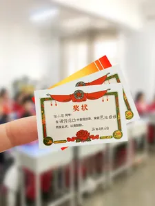 Close-up of mini reward stickers for children featuring classic certificate designs