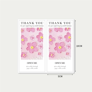 Detail of pink floral thank you stickers set with 10x5cm dimensions for gift sealing