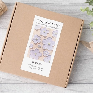 Pink floral thank you sticker on kraft gift box for bakery and packaging sealing