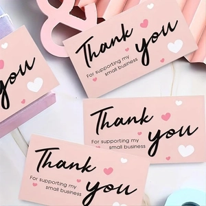 Pink thank you card for small business with hearts and elegant cursive typography