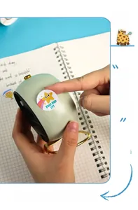 Close-up of yellow star reward sticker on clock surface with text You Did It