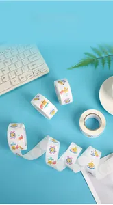 Macro view of cartoon reward sticker roll with 500 labels for kids encouragement