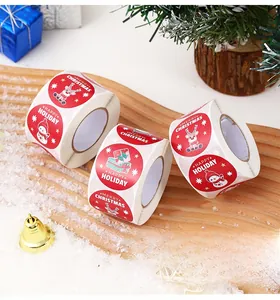 Christmas snowman round stickers on a roll for gift sealing and holiday decoration