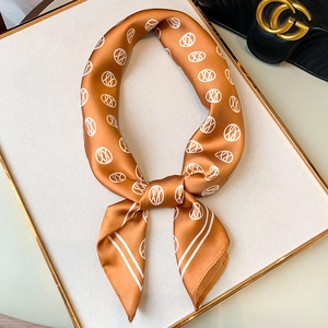 Elegant caramel brown satin square scarf with white geometric patterns for professional wear
