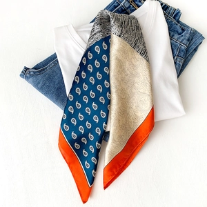 Silk paisley print square scarf with color block pattern and orange contrast edges