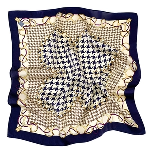 Elegant mulberry silk square scarf featuring navy houndstooth and golden chain patterns
