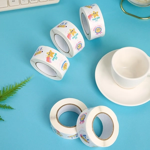 Roll of colorful cartoon reward stickers with motivational text and fun trophy icons