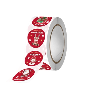 Roll of cartoon Christmas stickers with snowman and reindeer for holiday gift sealing
