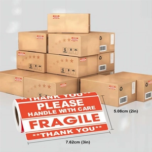 Detail of red fragile shipping labels 3x2 inch for boxes with handle with care warning