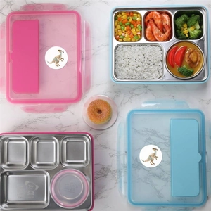Pink and blue stainless steel bento box with dinosaur stickers and compartments