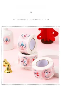 Detail of Christmas snowman roll stickers with festive holiday patterns for gift sealing
