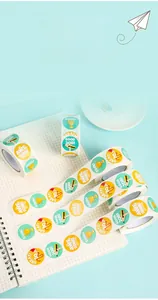 Close-up of colorful cartoon reward stickers on a roll for children and teachers