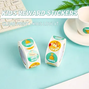 Rolls of colorful round cartoon stickers with trophy motifs and positive reward text