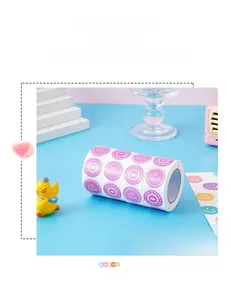 Pink heart label roll with Made With Love text for gift packaging and decoration