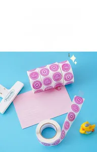 Detail of round 'Made with Love' heart stickers on a roll for gift packaging