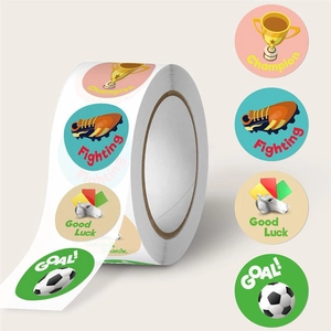 Detail of soccer reward stickers roll featuring trophy, cleats and motivational text