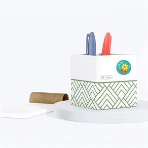 Minimalist square desk organizer with green geometric lines and star stickers on white stand