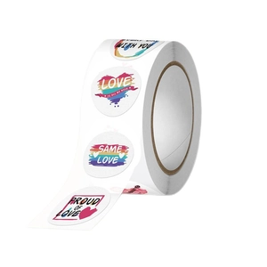 Rainbow LGBTQ+ heart stickers roll with Proud of Love text for gift decoration
