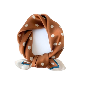 Silk neck scarf with white polka dots on caramel brown background and blue geometric borders