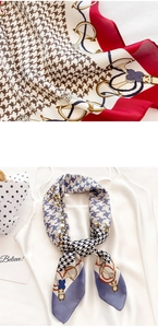 Detail view of houndstooth silk scarves with elegant chain patterns and panda motifs