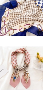 Detail of silk scarf showing houndstooth patterns and cute panda illustration print