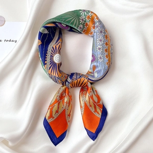 Elegant silk floral square scarf with vibrant orange daisy print and blue geometric border