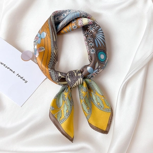 Elegant floral silk scarf in yellow and blue with vintage geometric print design