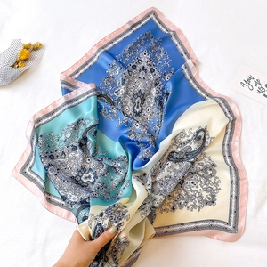 Elegant large paisley pattern silk scarf in navy and mint green for women's sun protection