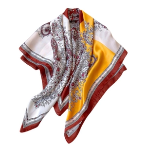 Bohemian paisley patterned silk scarf with retro red and yellow geometric blocks