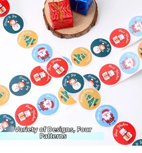 Detailed view of four festive Christmas stickers with Santa and snowman on gift boxes