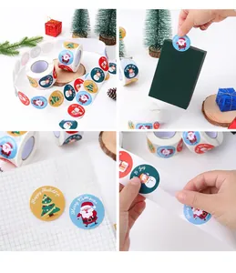 Close-up of circular Christmas seal stickers with cartoon Santa and snowman illustrations