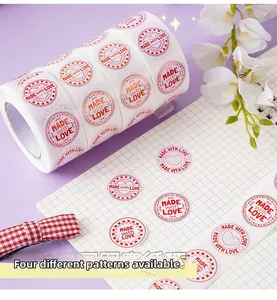 Detail of round heart stickers in red and white with Made with Love text designs