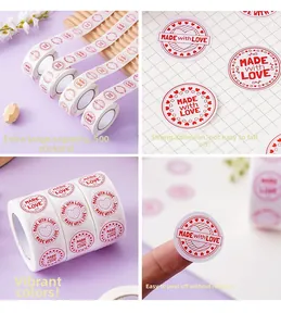 Detail of round Made with Love stickers on a roll for gift packaging decoration