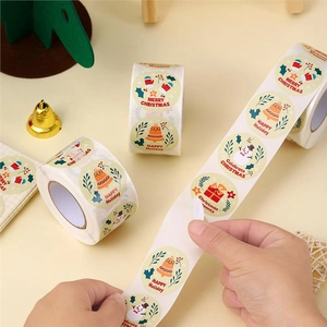 Set of Christmas stickers with snowman and bell patterns on high-quality paper rolls