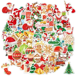 Macro shot of colorful waterproof Christmas stickers with Santa, reindeer and snowman designs