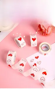 Detail of heart pattern Valentine stickers roll for gift wrapping and DIY decor