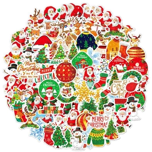Flat lay of colorful waterproof Christmas stickers featuring Santa, snowman and reindeer