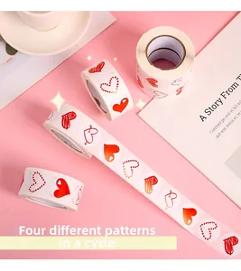 Detail of adhesive heart sticker roll featuring four assorted artistic Valentine designs