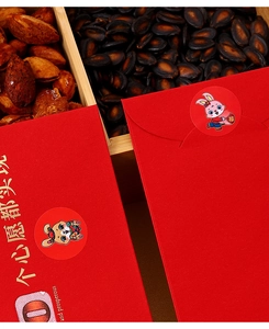 Macro shot of red Chinese New Year envelopes with gold embossing and cartoon rabbit seals