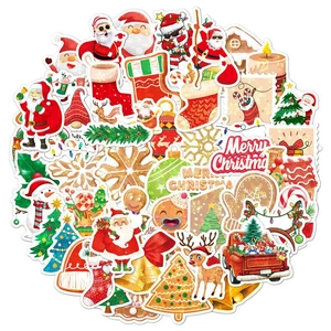 Close-up of holographic Christmas stickers featuring Santa, reindeer and festive patterns