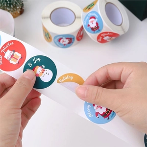 Cartoon snowman Merry Christmas sticker roll for holiday gift packaging and sealing