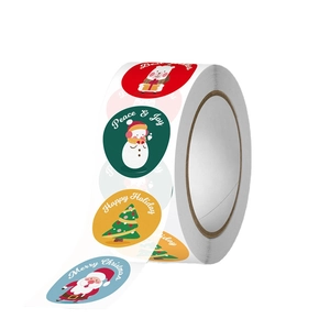 Roll of cartoon snowman and Santa Christmas stickers for holiday gift packaging and sealing