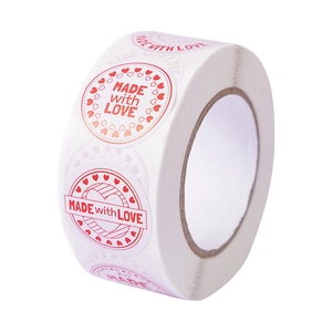 Roll of round Made With Love heart stickers for gift packaging and Valentine decoration