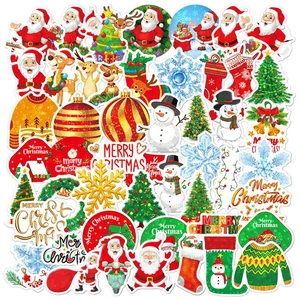 Detail of holographic laser Christmas stickers featuring Santa, reindeer, and snowflakes