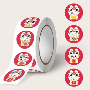 Roll of Chinese New Year rabbit stickers with festive lion dance cartoon designs