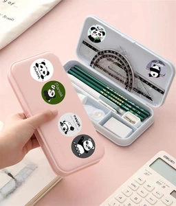 Detailed view of a pink double-layer pencil box set with cute panda stickers and stationery