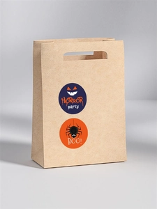 Detail of Halloween stickers with horror party and spider designs on kraft gift bags