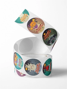 Detail of round Halloween roll stickers featuring cute pumpkin and bat cartoon designs