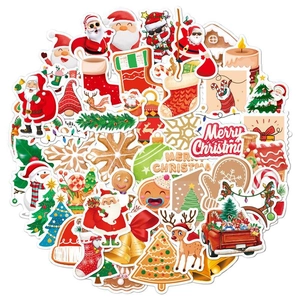Close-up of holographic laser Christmas stickers featuring Santa, reindeer and snowman motifs